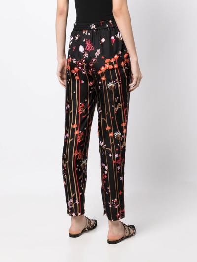 Shop Red Valentino Star-print Silk Trousers In Black