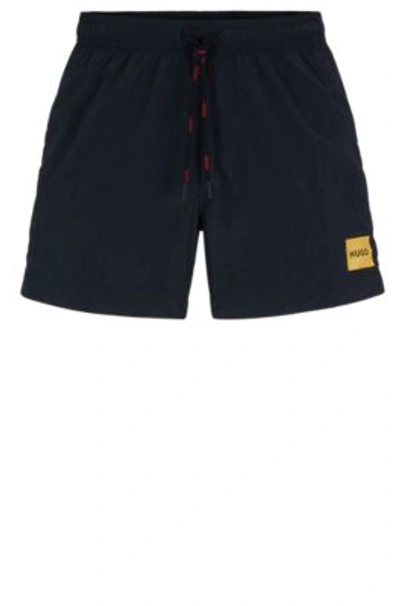 Shop Hugo Quick-dry Swim Shorts With Red Logo Label In Black