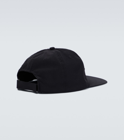 Shop Satisfy Peaceshell Running Cap In Black