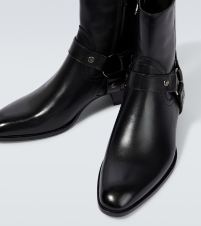 Shop Saint Laurent Wyatt Harness Leather Ankle Boots In Nero