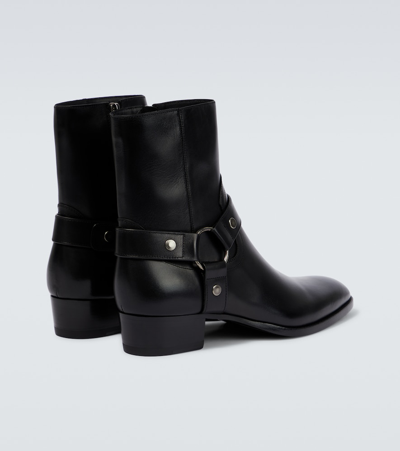 Shop Saint Laurent Wyatt Harness Leather Ankle Boots In Nero