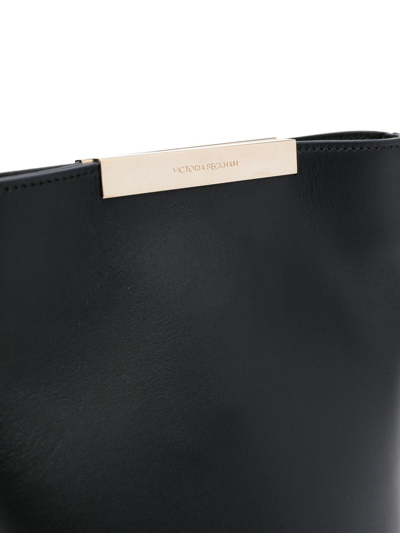 Shop Victoria Beckham Engraved-logo Bucket Bag In Black