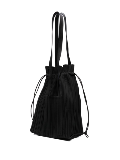 Shop Issey Miyake Fully-pleated Drawstring Tote Bag In Black