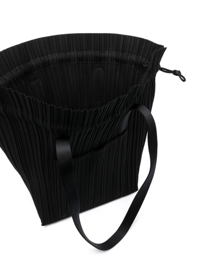 Shop Issey Miyake Fully-pleated Drawstring Tote Bag In Black