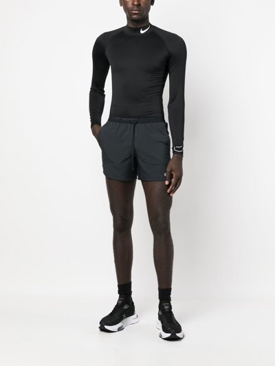 Shop Nike Swoosh-print Running Shorts In Black