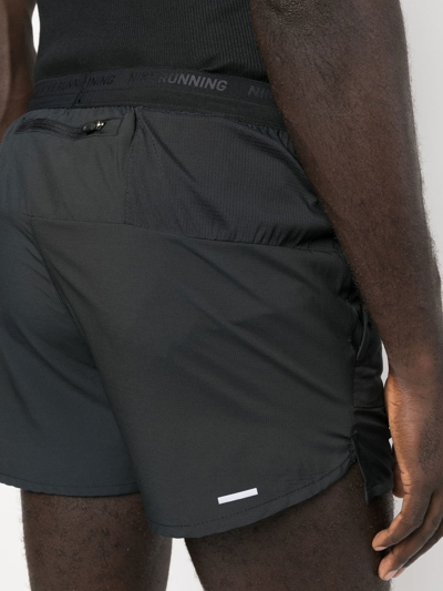 Shop Nike Swoosh-print Running Shorts In Black