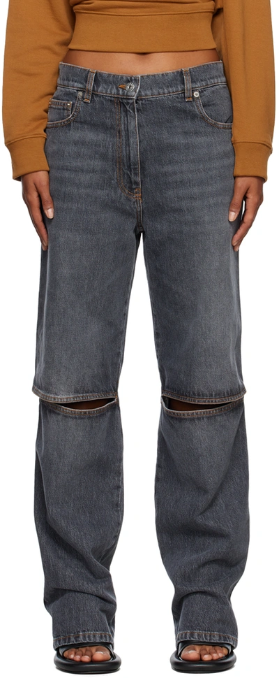 Shop Jw Anderson Gray Cut Out Knee Bootcut Jeans In 929 Grey