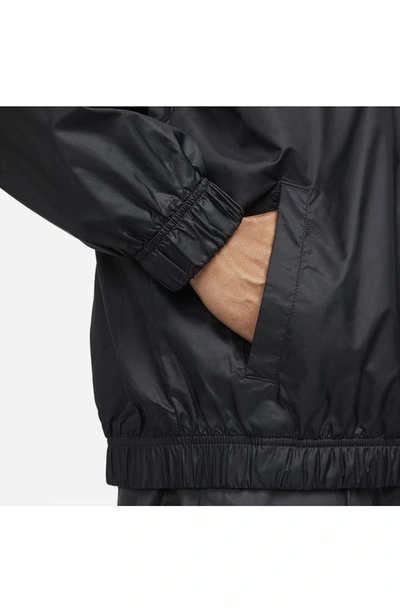 Shop Nike Water Repellent Half Zip Pullover In Black/ White