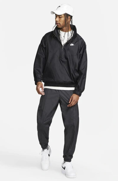 Shop Nike Water Repellent Half Zip Pullover In Black/ White