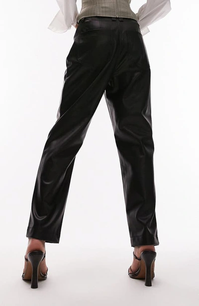 Shop Topshop Faux Leather Peg Trousers In Black