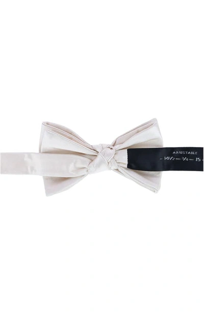 Shop Trafalgar Sutton Solid Silk Bow Tie In Cream