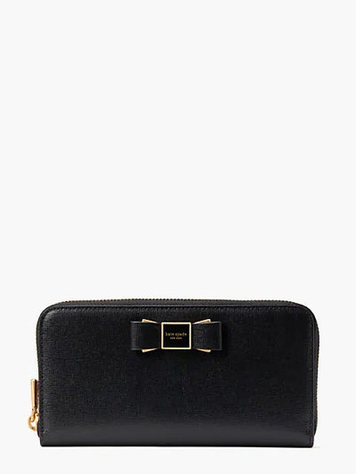Shop Kate Spade Morgan Bow Embellished Zip-around Continental Wallet In Black