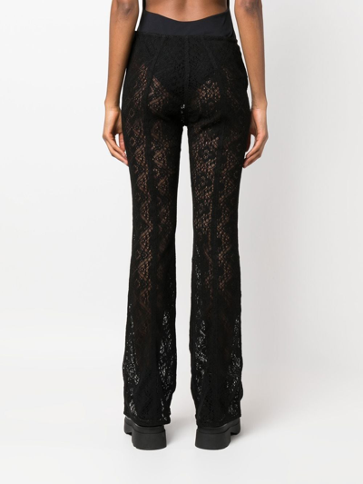 Ganni Lace Sheer Flared Trousers In Black