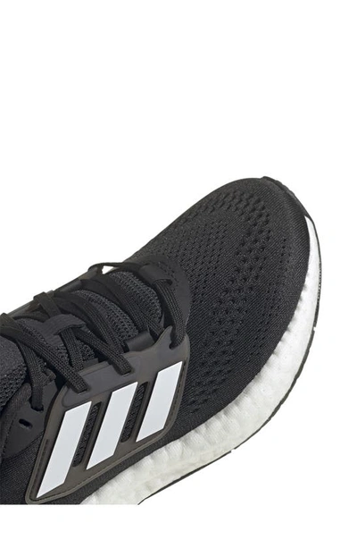 Shop Adidas Originals Pureboost 22 Running Shoe In Black/ Black/ Carbon