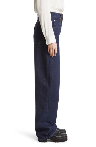 Shop Frame High Waist Extra Long Barrel Jeans In Rinse