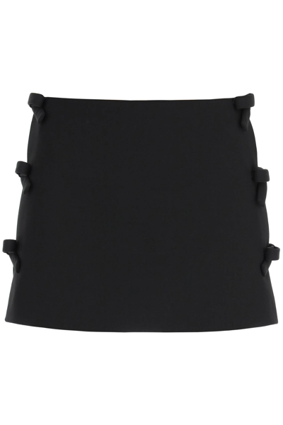 Shop Valentino Crepe Couture Skort With Bows In Black