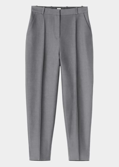 Shop Totême Sewn Pleated Tapered-leg Ankle Trousers In Steel