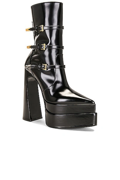 Shop Versace Buckle Platform Boots In Nero & Oro