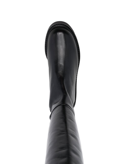 Shop Stuart Weitzman Lift Asymmetric Knee Boots In Black