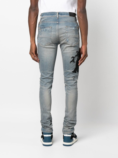 Amiri Wes Lang Skinny-fit Distressed Embroidered Jeans In Grey | ModeSens