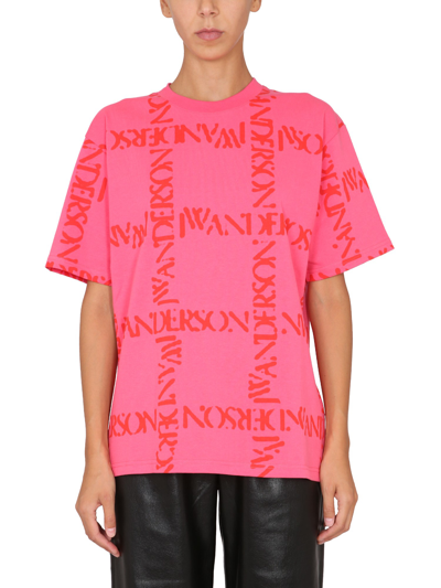 Shop Jw Anderson T-shirt With All Over Logo In Pink