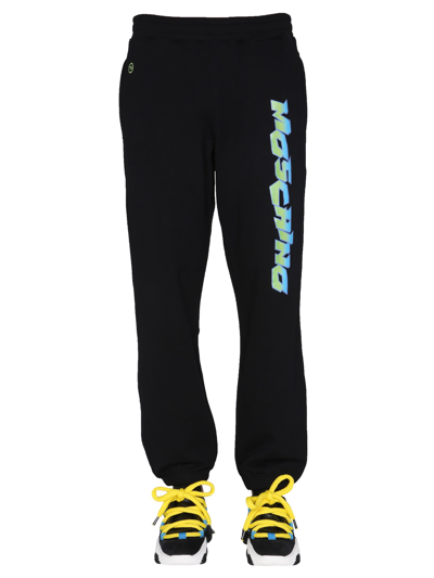 Shop Moschino "surf" Jogging Pants In Black