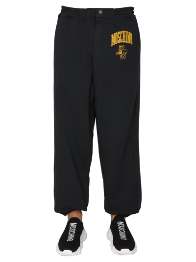 Shop Moschino Jogging Pants In Black