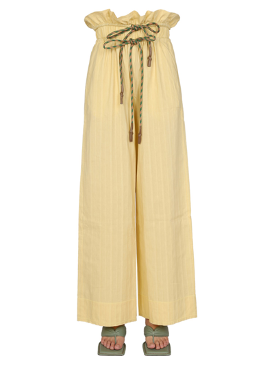 Shop Miista Wide Leg Pants In Yellow