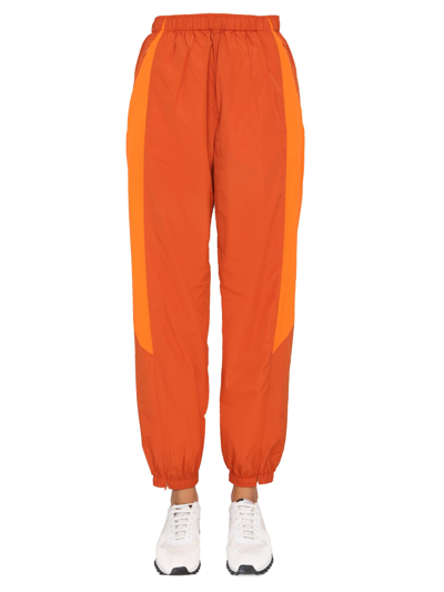 Shop Y-3 Jogging Pants In Orange