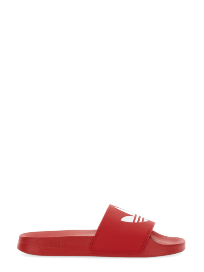 Shop Adidas Originals Adilette Sandal In Red