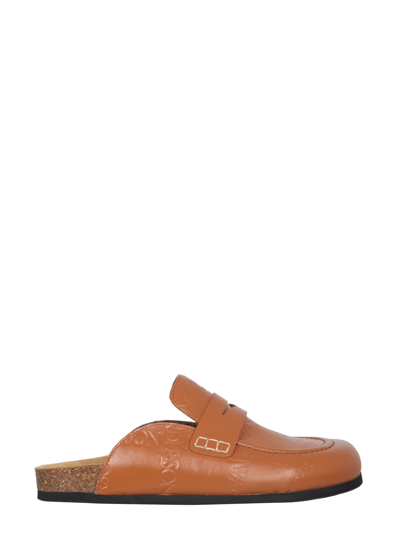 Shop Jw Anderson Leather Mules In Brown