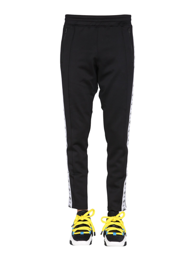 Moschino Jogging Pants With Adjustable Drawstring And Zippered Pockets In Black