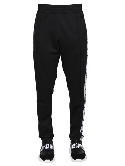 Shop Moschino Jogging Pants In Black