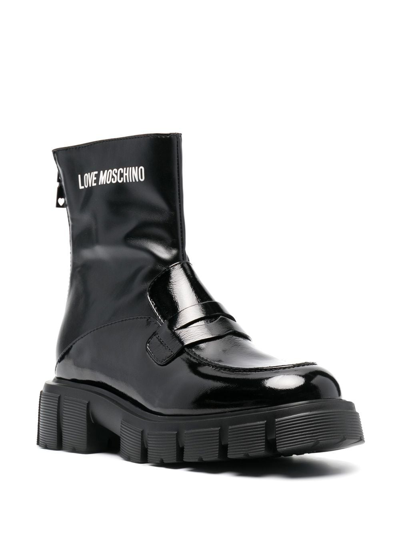 Shop Love Moschino Logo-print Ankle Boots In Black