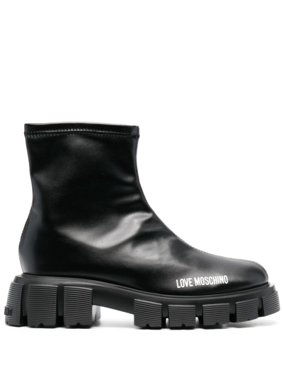 Shop Love Moschino 50mm Logo-print Studded Sole Boots In Black