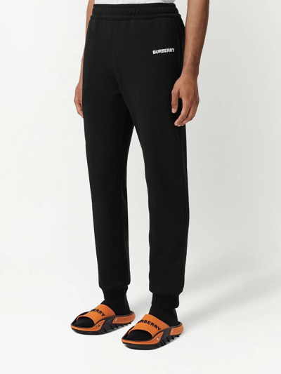 Shop Burberry Men Logo Print Track Pants In Black