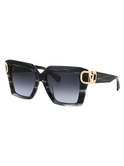 Shop Valentino Sunglasses In Translucent Black Swirl - V-light Gold