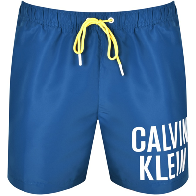 Shop Calvin Klein Logo Swim Shorts Blue