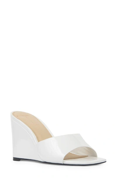Shop Black Suede Studio Paola Wedge Sandal In White Patent