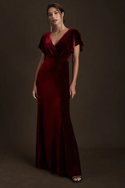 Shop Jenny Yoo Ellis Flutter-sleeve Open-back Stretch Velvet Gown In Red