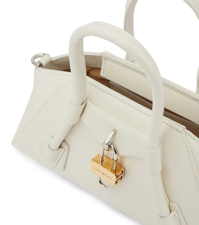 Shop Givenchy Antigona Mini Stretch Leather Shoulder Bag In 105-ivory