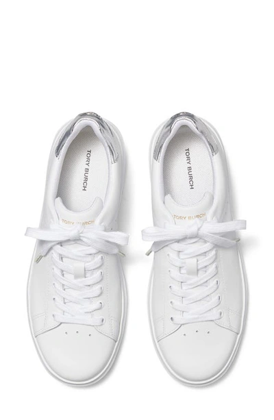 Shop Tory Burch Howell Sneaker In Titanium White / Silver