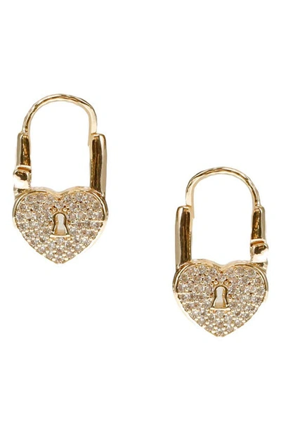 Shop Covet Heart Padlock Huggie Hoop Earrings In Gold