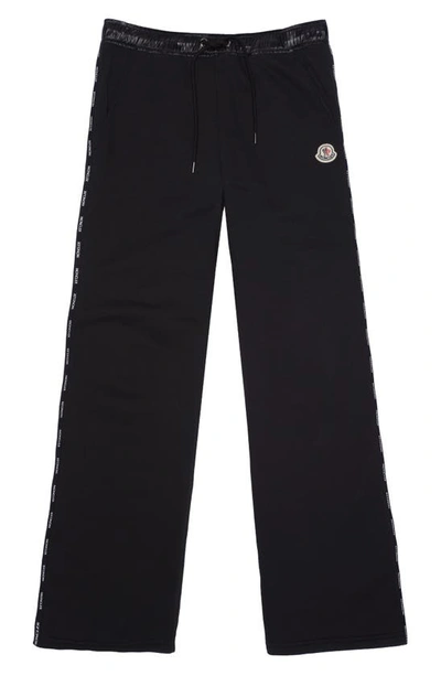 Shop Moncler Logo Tape Sweatpants In Black