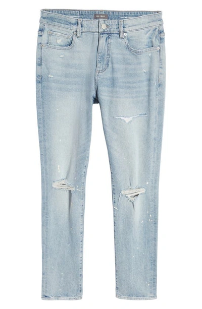 Shop Dl1961 Theo Distressed Relaxed Tapered Jeans In Light Indigo Distressed