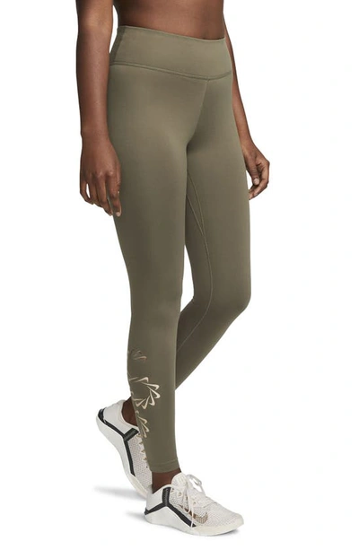 Shop Nike Therma-fit One Graphic Training Leggings In Medium Olive/ Black