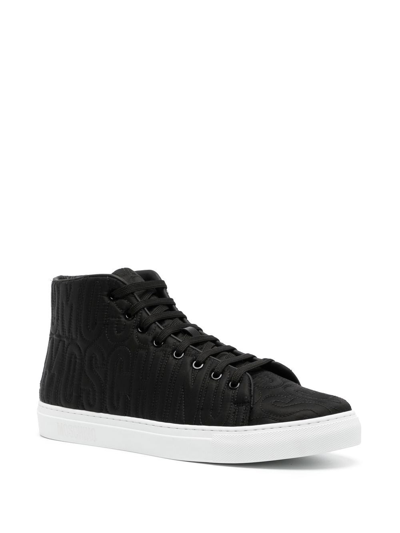 Shop Moschino Debossed-logo High-top Sneakers In Black