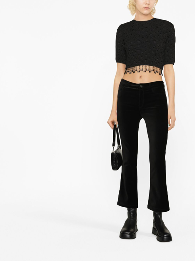 Paige Mid-rise Flared Jeans In Black