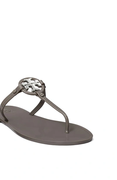 Shop Tory Burch Mini Miller Jelly Thong Sandal In River Rock / Silver