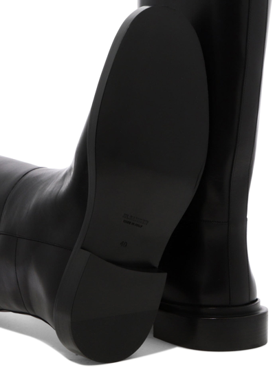Shop Jil Sander Leather Slip-into Boots In Black